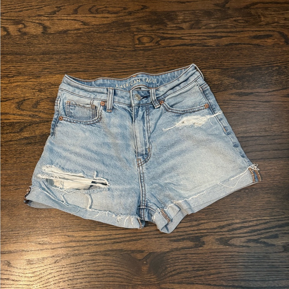 American Eagle Women's Light Blue Ripped Jean Shorts, size 0
